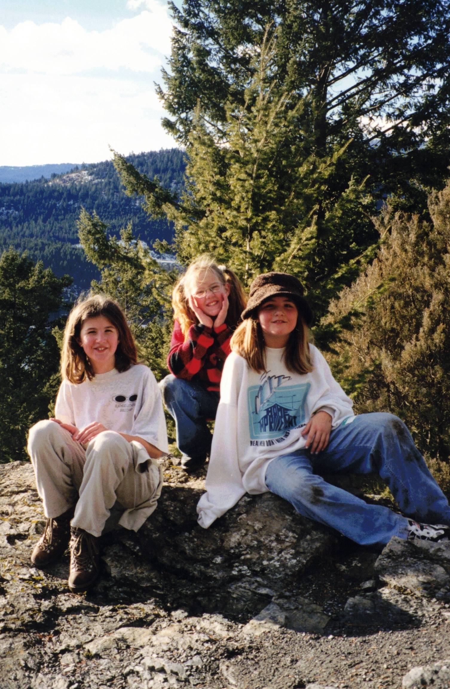 Campers enjoy the summit of Sunset Mountain after an afternoon  hike with their counselor. 