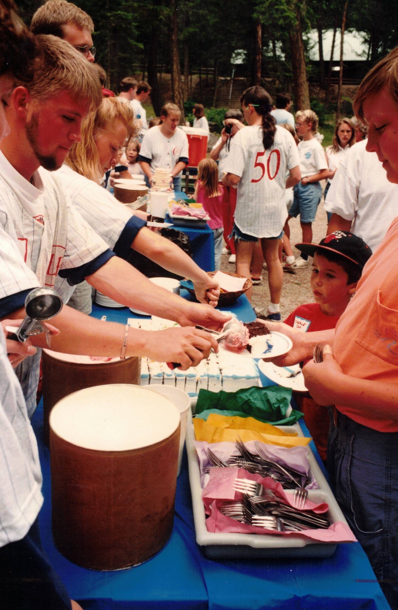 Guests enjoy cake and Ice cream at the close of the 50th celebration.