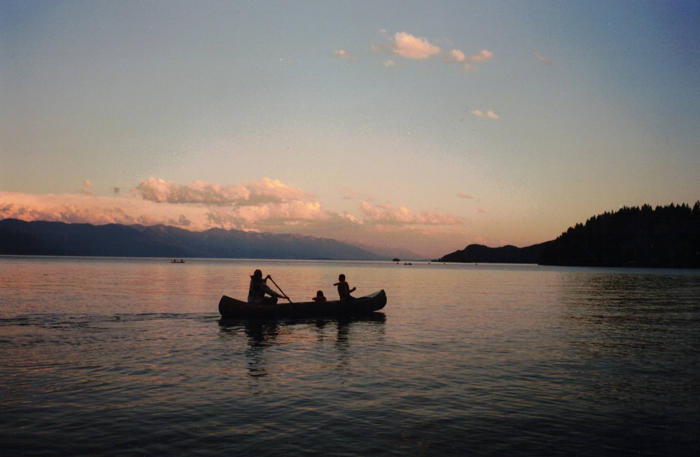 A canoe paddle before campfire