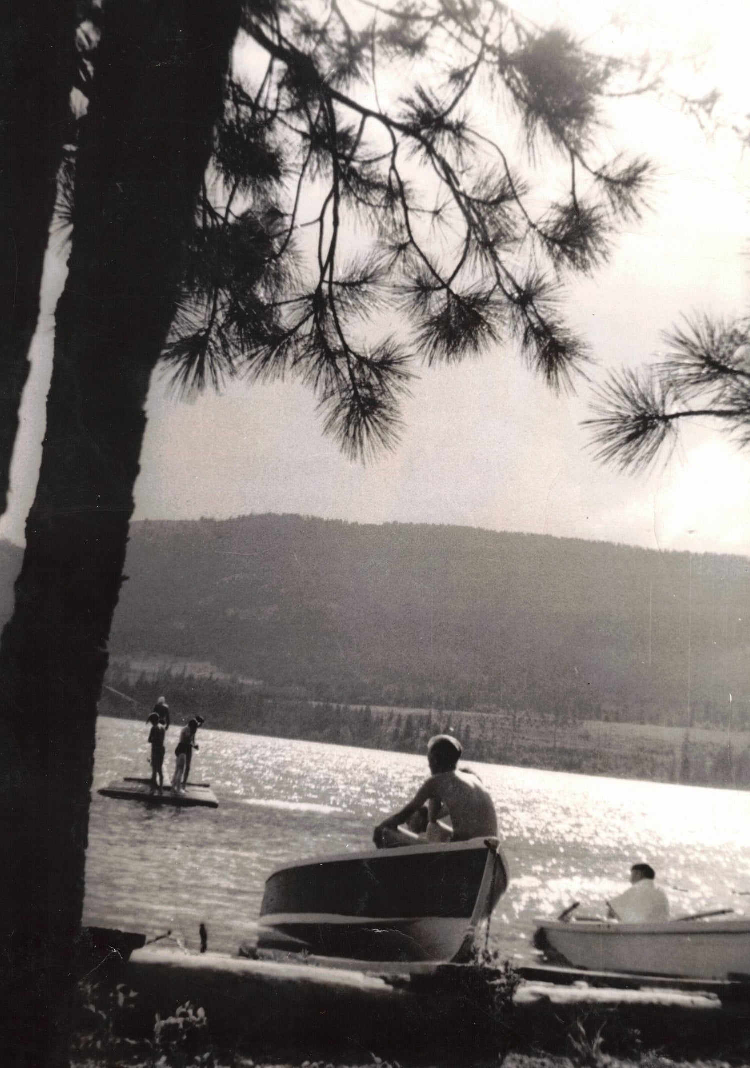 The Methodist Camp waterfront in 1934 featured wooden rowboats and a log raft to swim to and dive off.