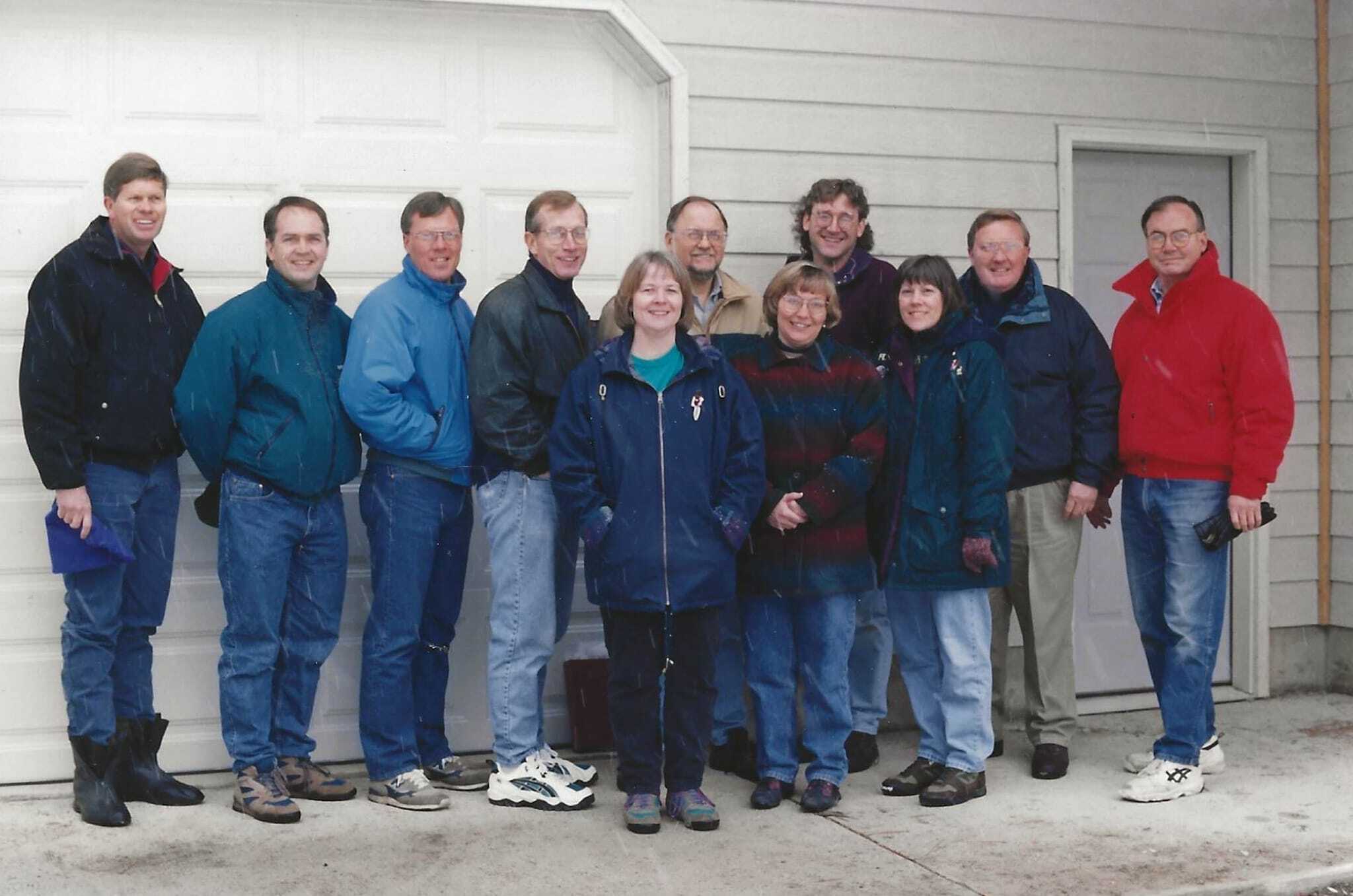 The Camp board of directors in the mid 1990s in front of the newly completed Ocee Johnson House